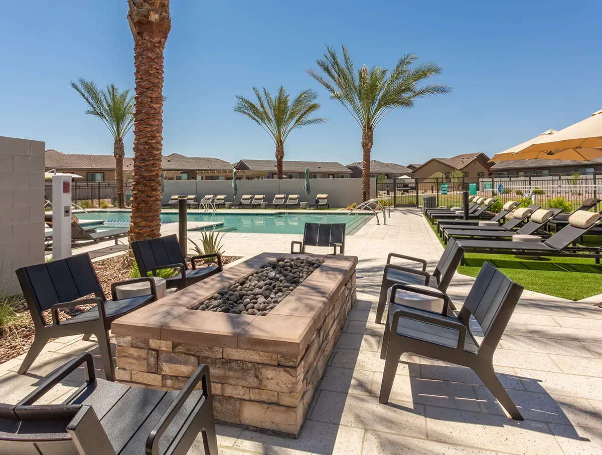 Outdoor fire-pit table and chairs at Village Sonoran Vista.
