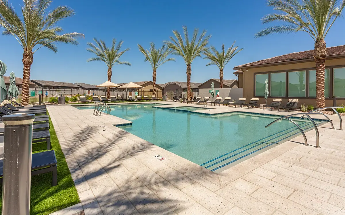 Swimming pool and landscaped deck at Village Sonoran Vista.