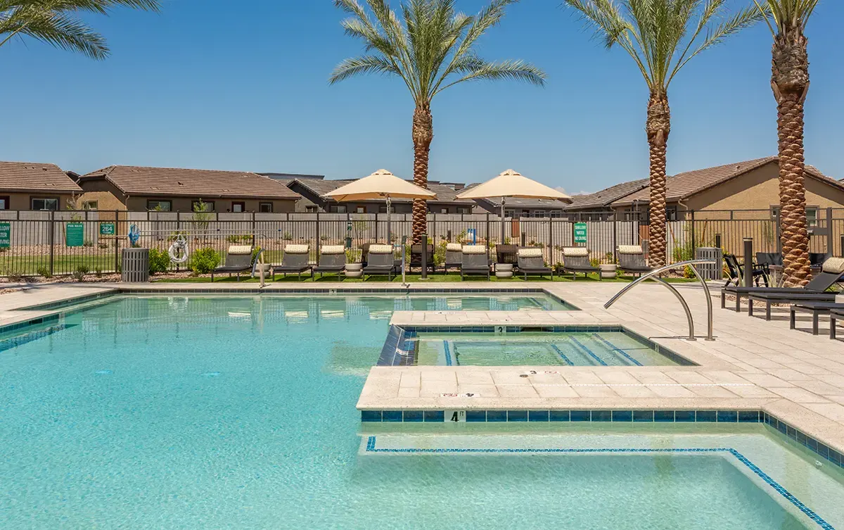 Swimming pool and adjoining hot tub at Village Sonoran Vista.