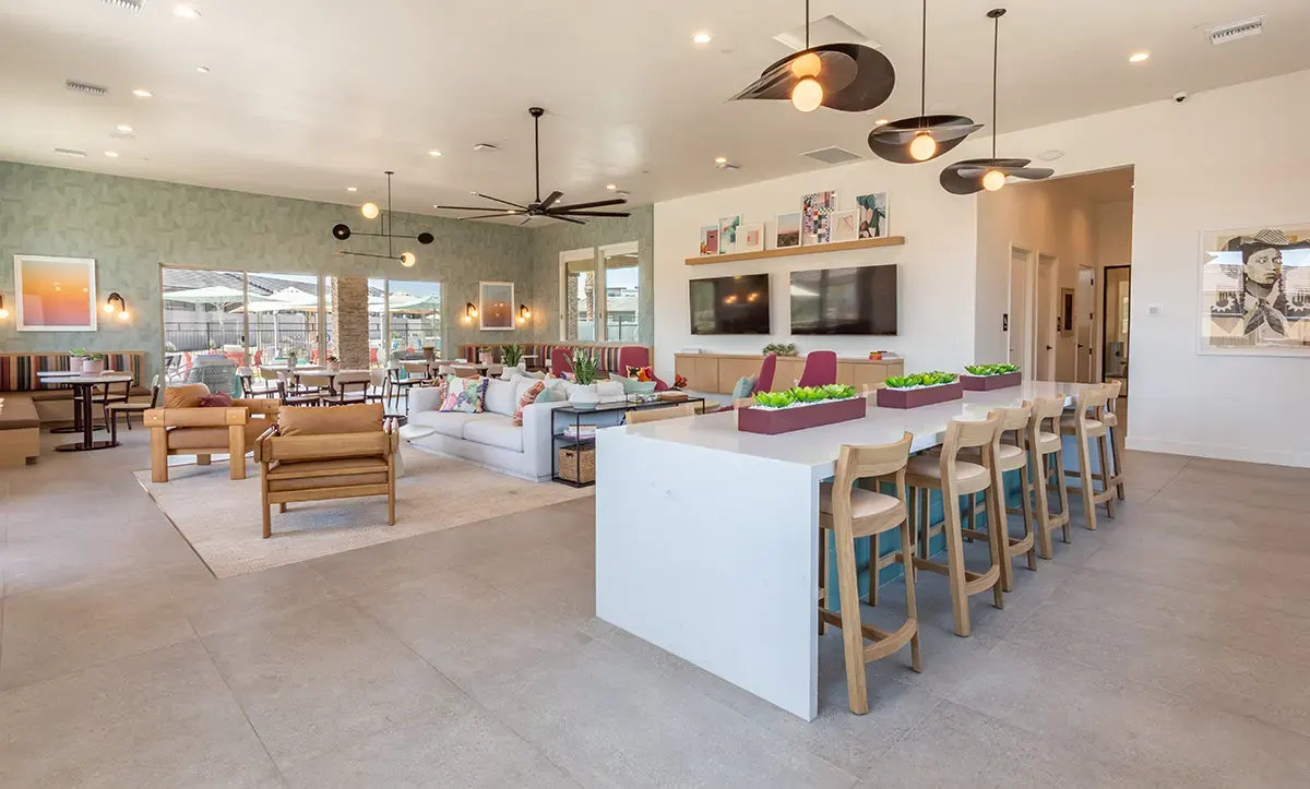 Clubhouse kitchen and lounge at Village Sonoran Vista.