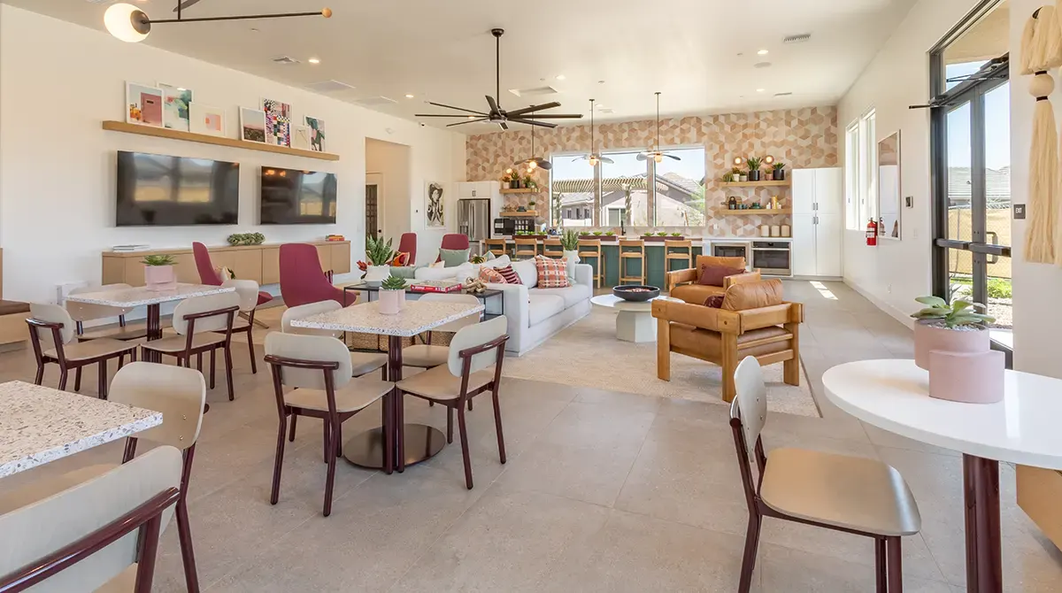 Clubhouse lounge and television at Village Sonoran Vista.