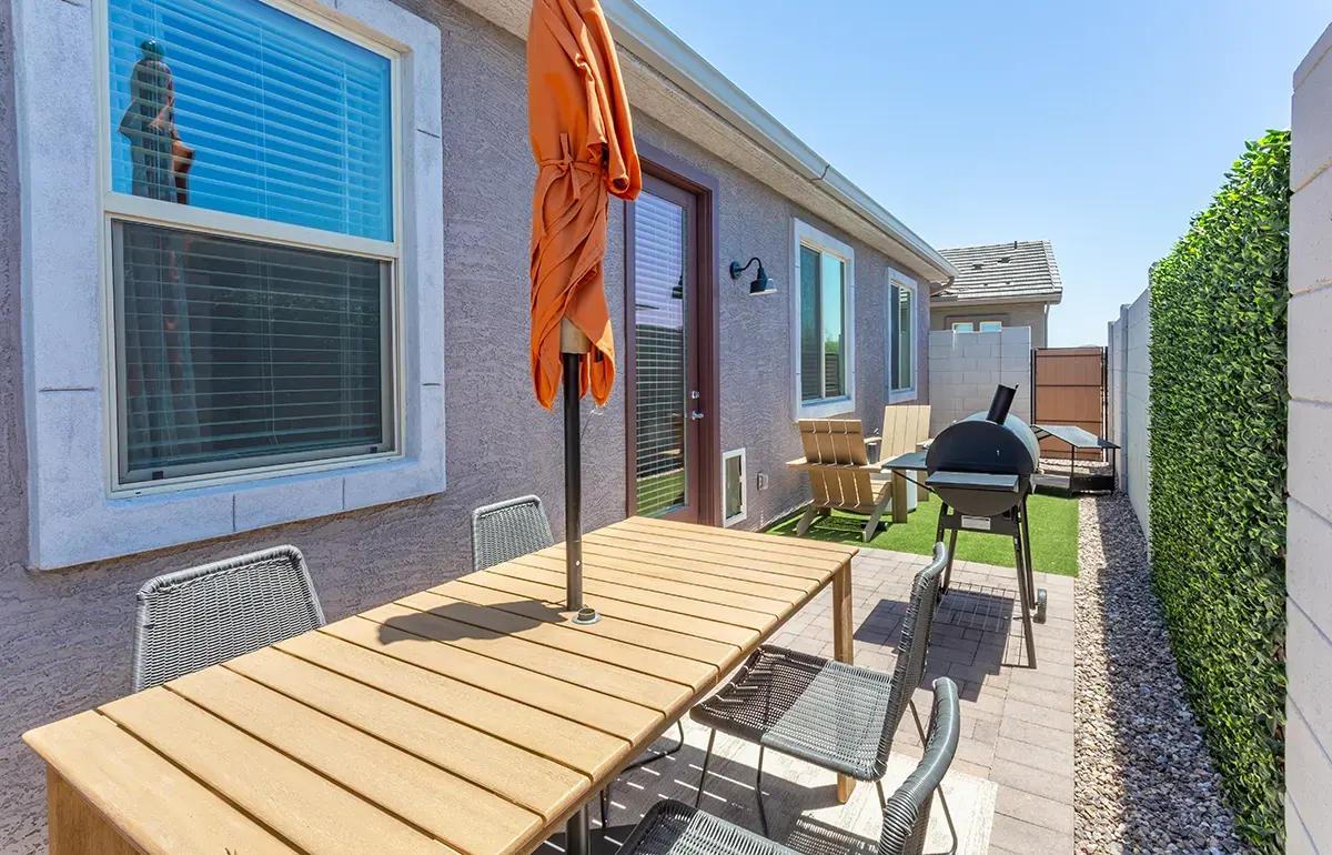 Private backyard patio table at Village Sonoran Vista.
