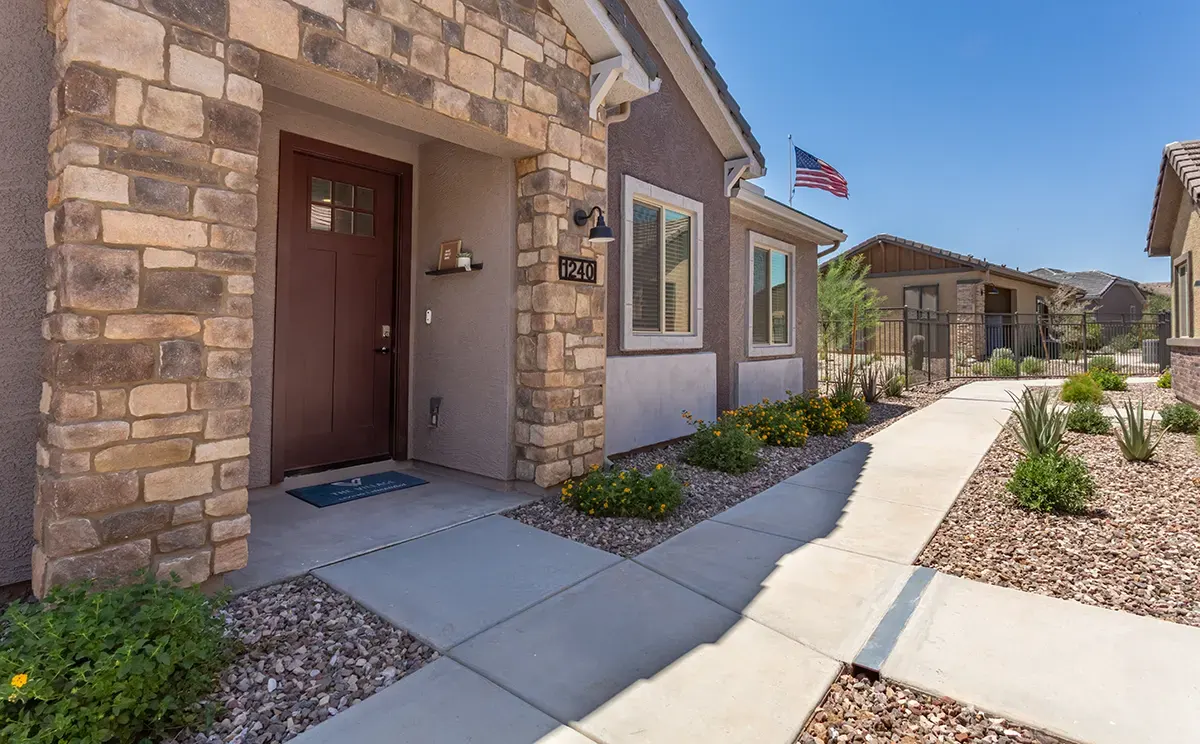 Single-story home exteriors at Village Sonoran Vista.