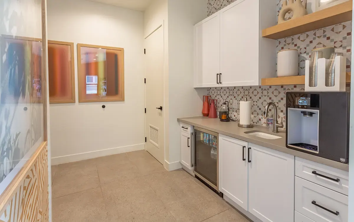 Shared beverage counter and cabinets at Village Sonoran Vista.