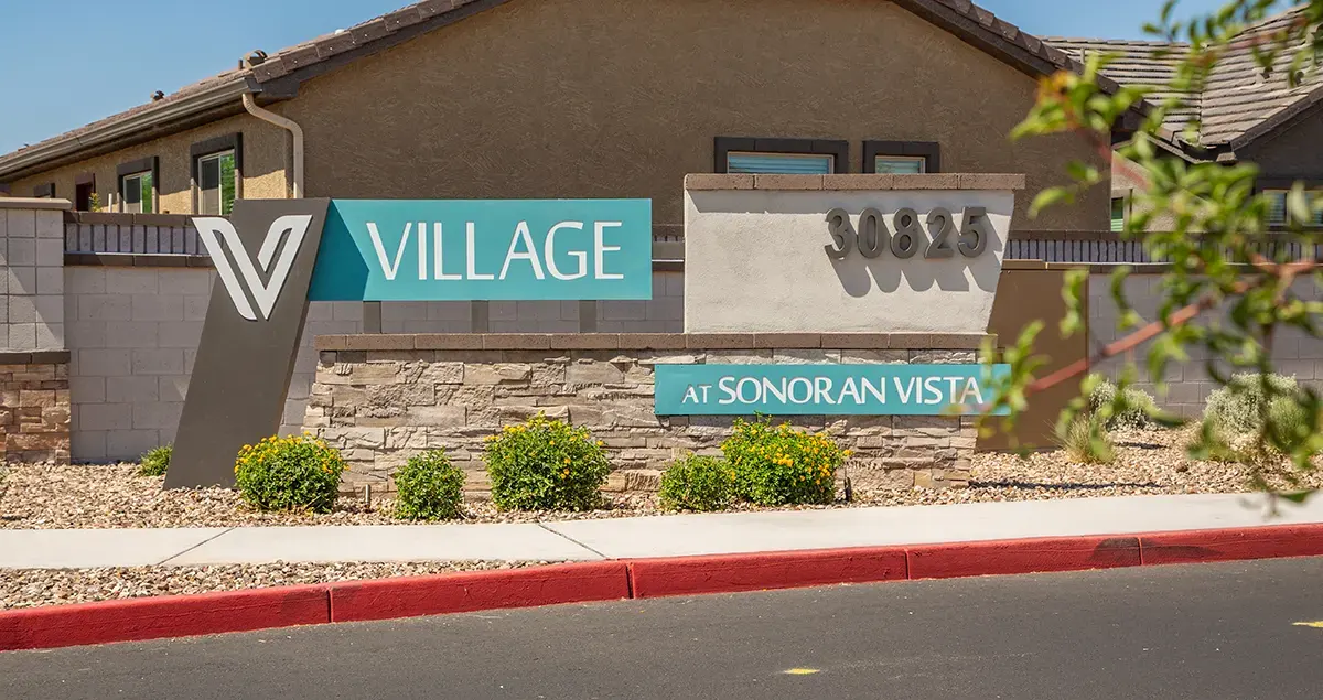 Community entrance monument at Village Sonoran Vista.
